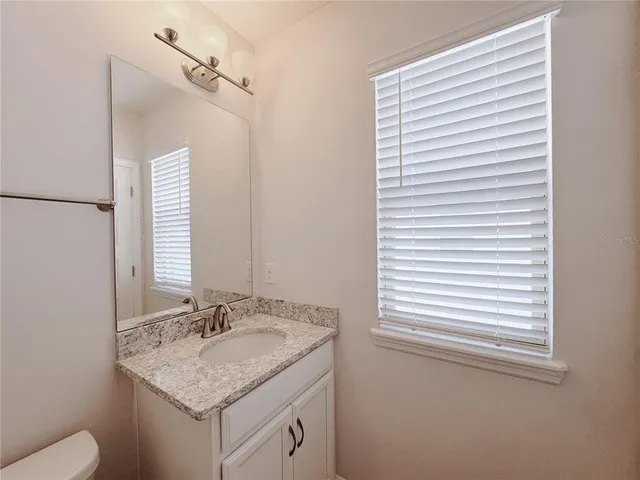 a view of a city that has lawn chairs