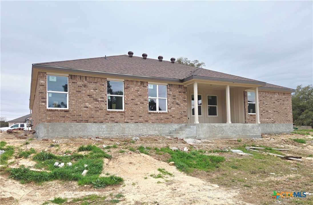 1412 Fossil Trail Belton, TX 76513 - Photo 5 of 9 a front view of a house with a yard and garage