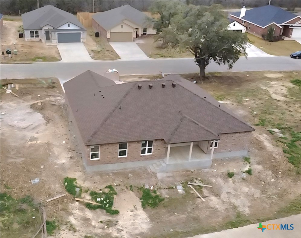 1412 Fossil Trail Belton, TX 76513 - Photo 6 of 9 an aerial view of a house with a yard