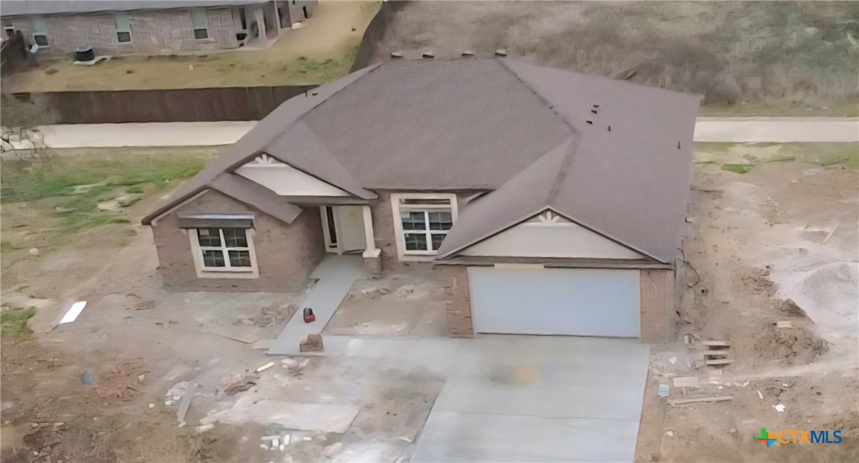 1412 Fossil Trail Belton, TX 76513 - Photo 8 of 9 a front view of a house with a yard
