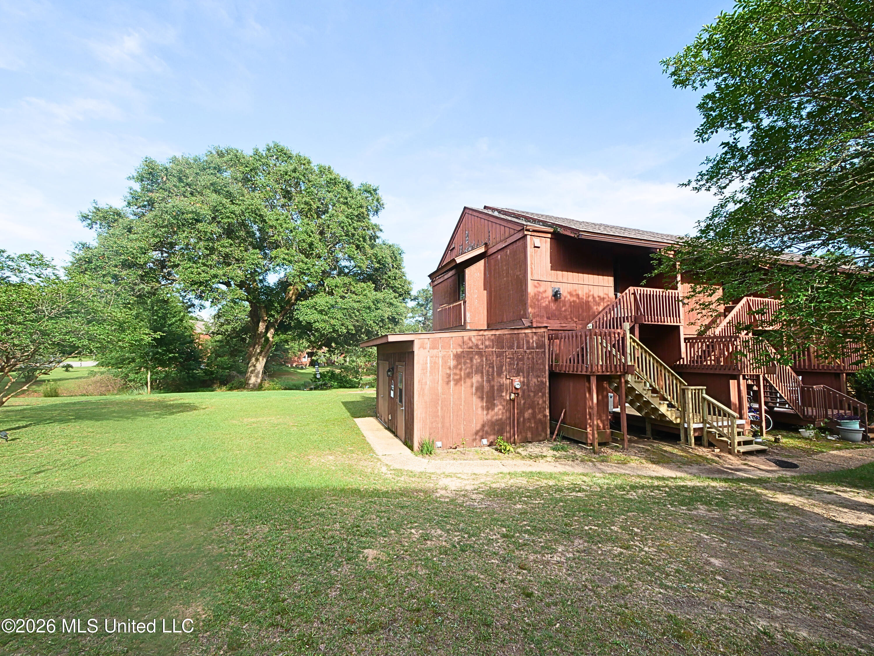 208 Lakeside Villa, Unit A Diamondhead, MS 39525 - Photo 1 of 16 P1120825 - Edited