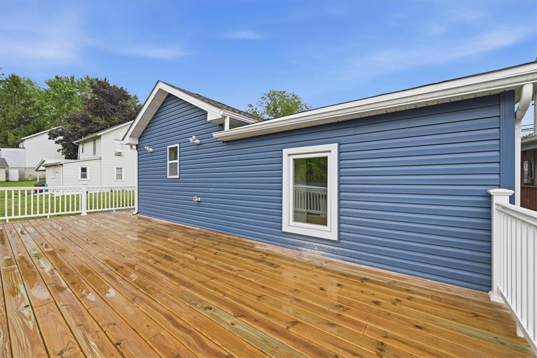 5641 North Coplay Road Whitehall, PA 18052 - Photo 51 of 68 A spacious wooden deck provides ample outdoor living space, perfect for entertaining.