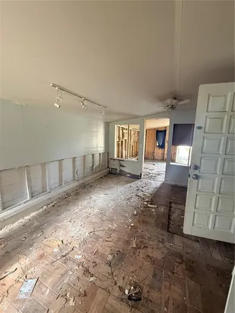 a view of a livingroom with furniture and a fireplace