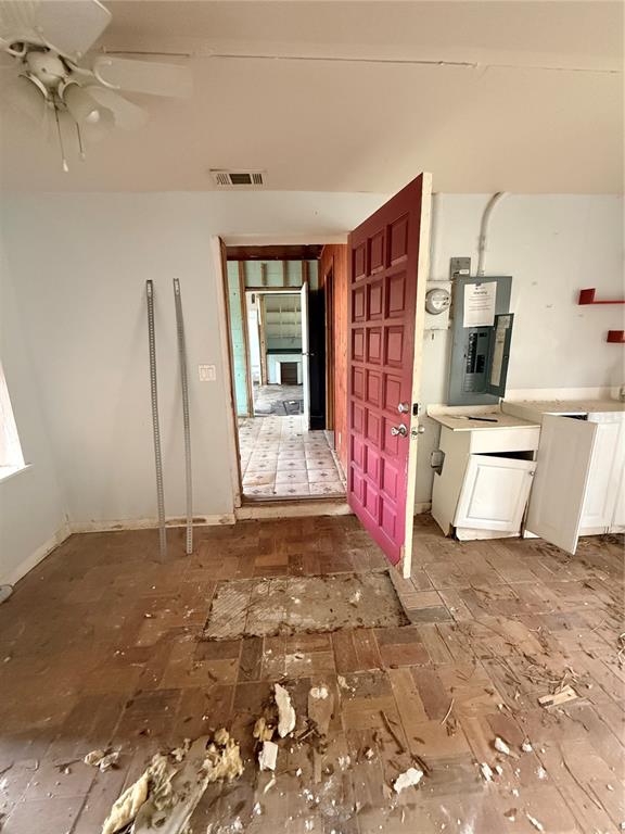 40 Hall Street Frostproof, FL 33843 - Photo 15 of 18 a view of an empty room with a fireplace