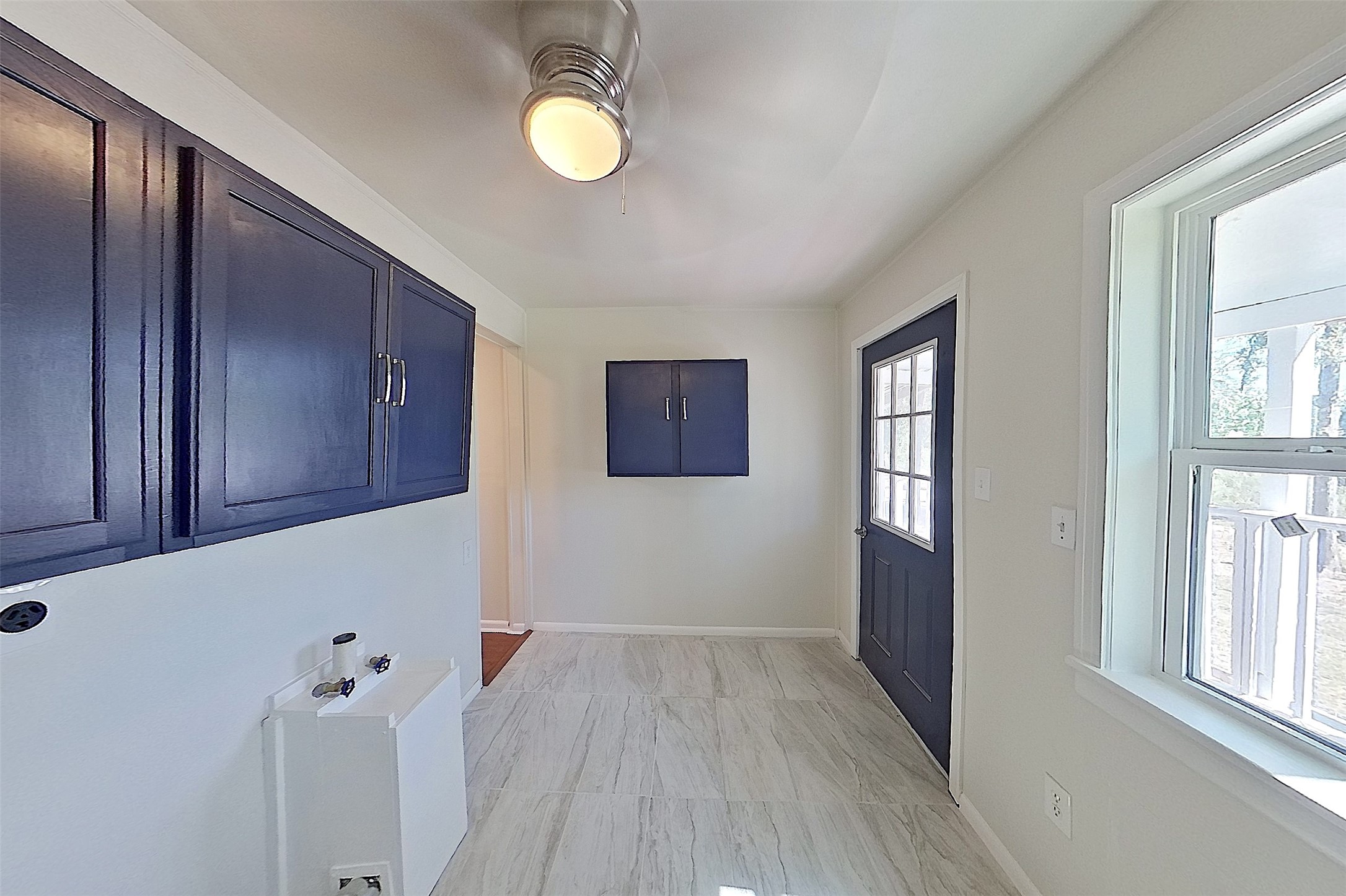 24254 Jane Avenue Porter, TX 77365 - Photo 18 of 26 a view of an empty room with a window and wooden floor
