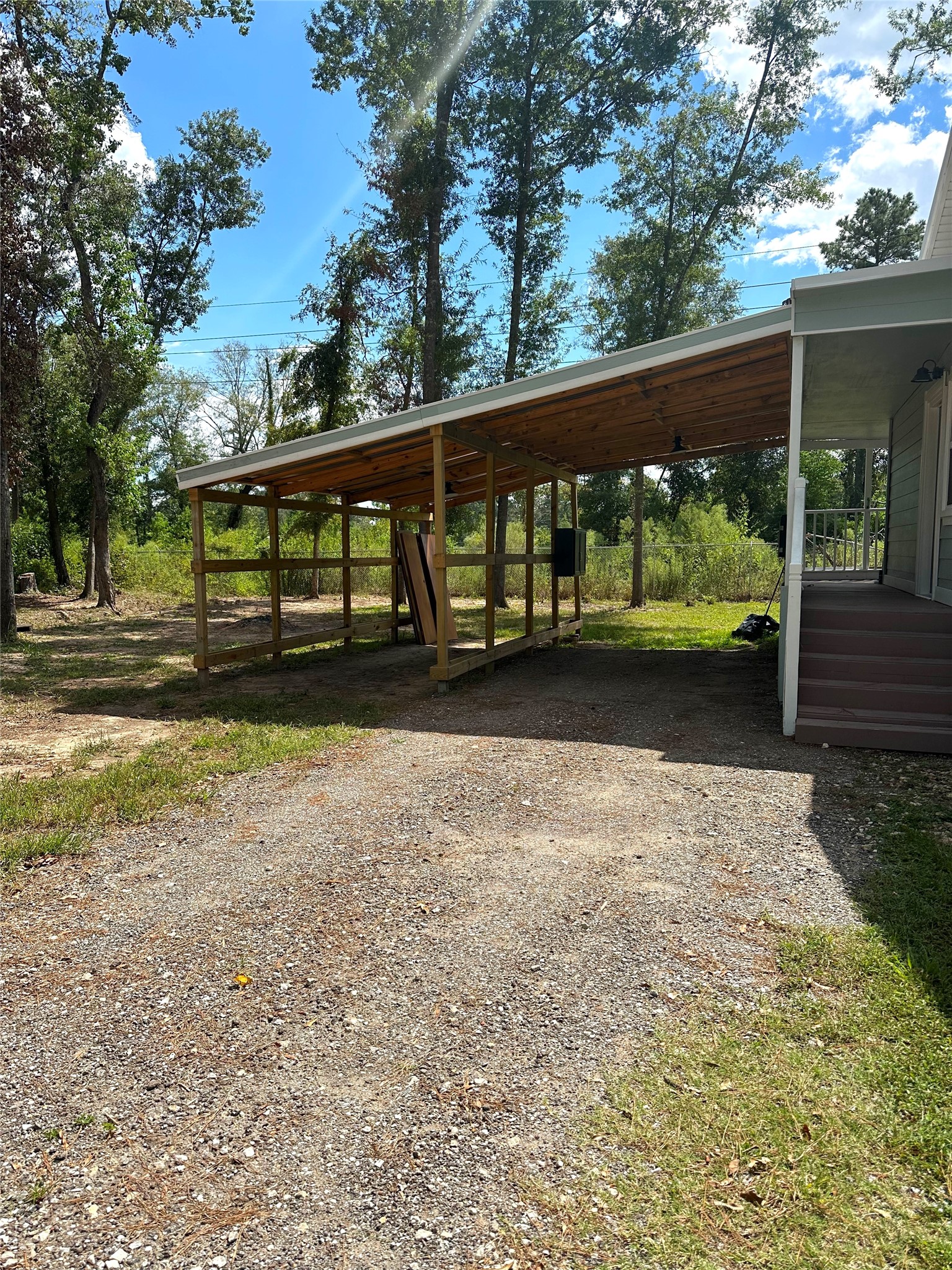 24254 Jane Avenue Porter, TX 77365 - Photo 19 of 26 a view of a car in front of a house
