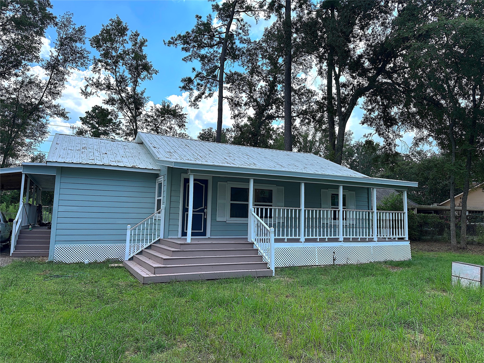 24254 Jane Avenue Porter, TX 77365 - Photo 23 of 26 a house view with a garden space