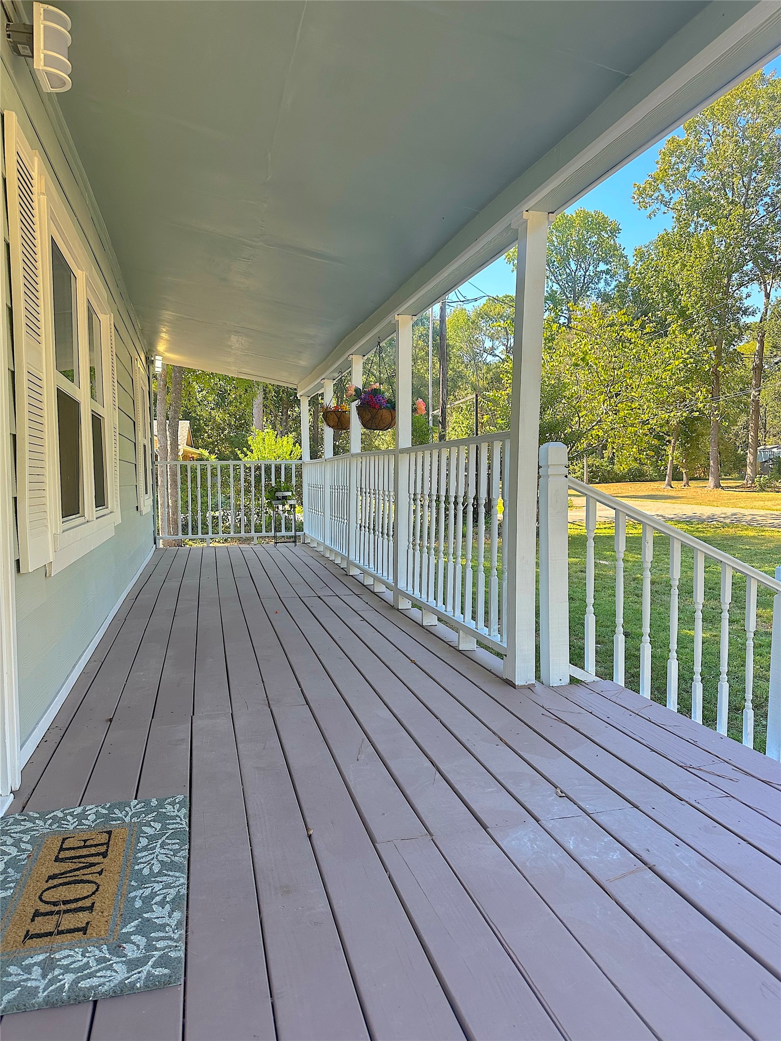 24254 Jane Avenue Porter, TX 77365 - Photo 24 of 26 a view of a balcony with wooden floor