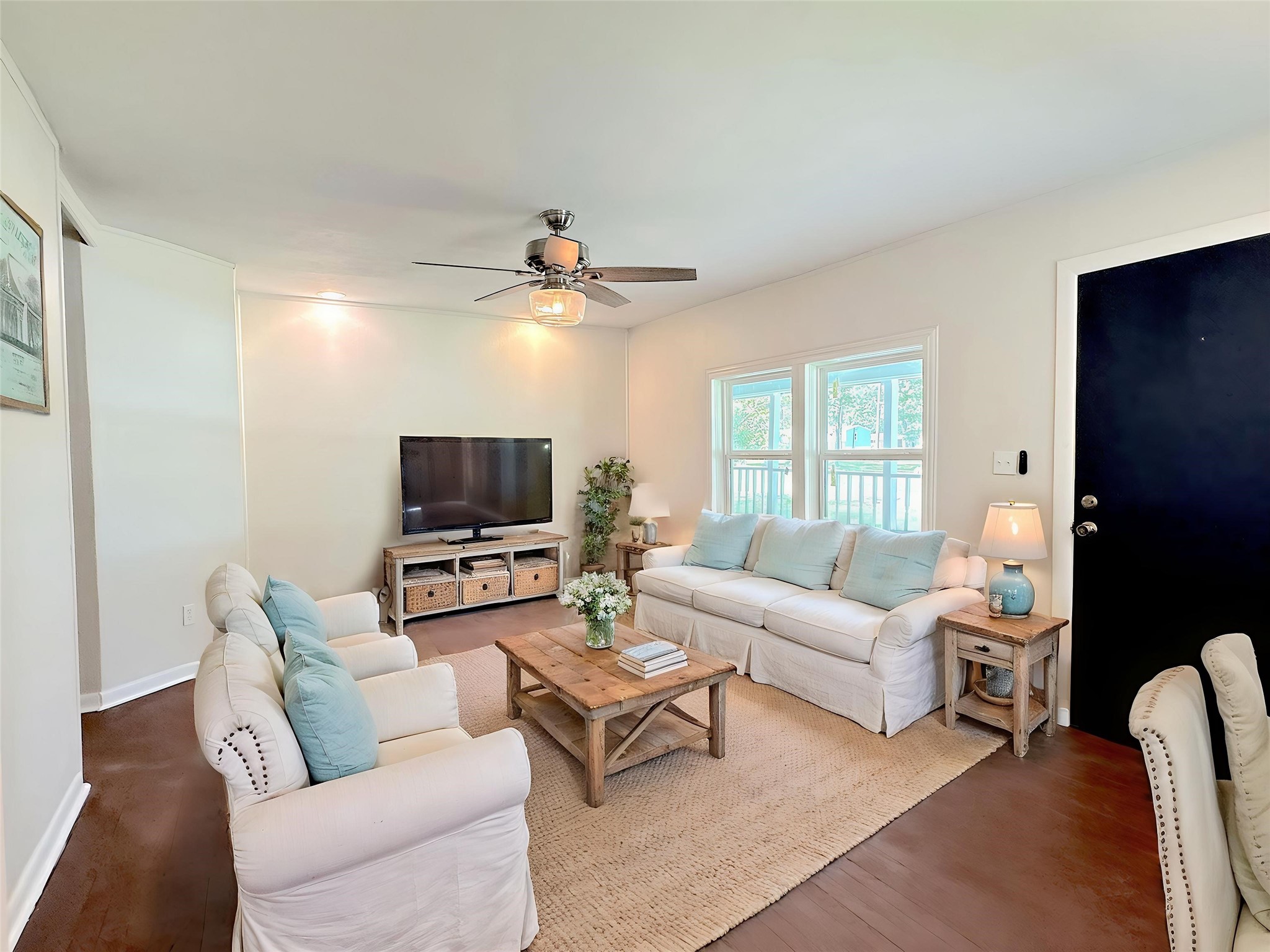 24254 Jane Avenue Porter, TX 77365 - Photo 7 of 26 a living room with furniture and a flat screen tv