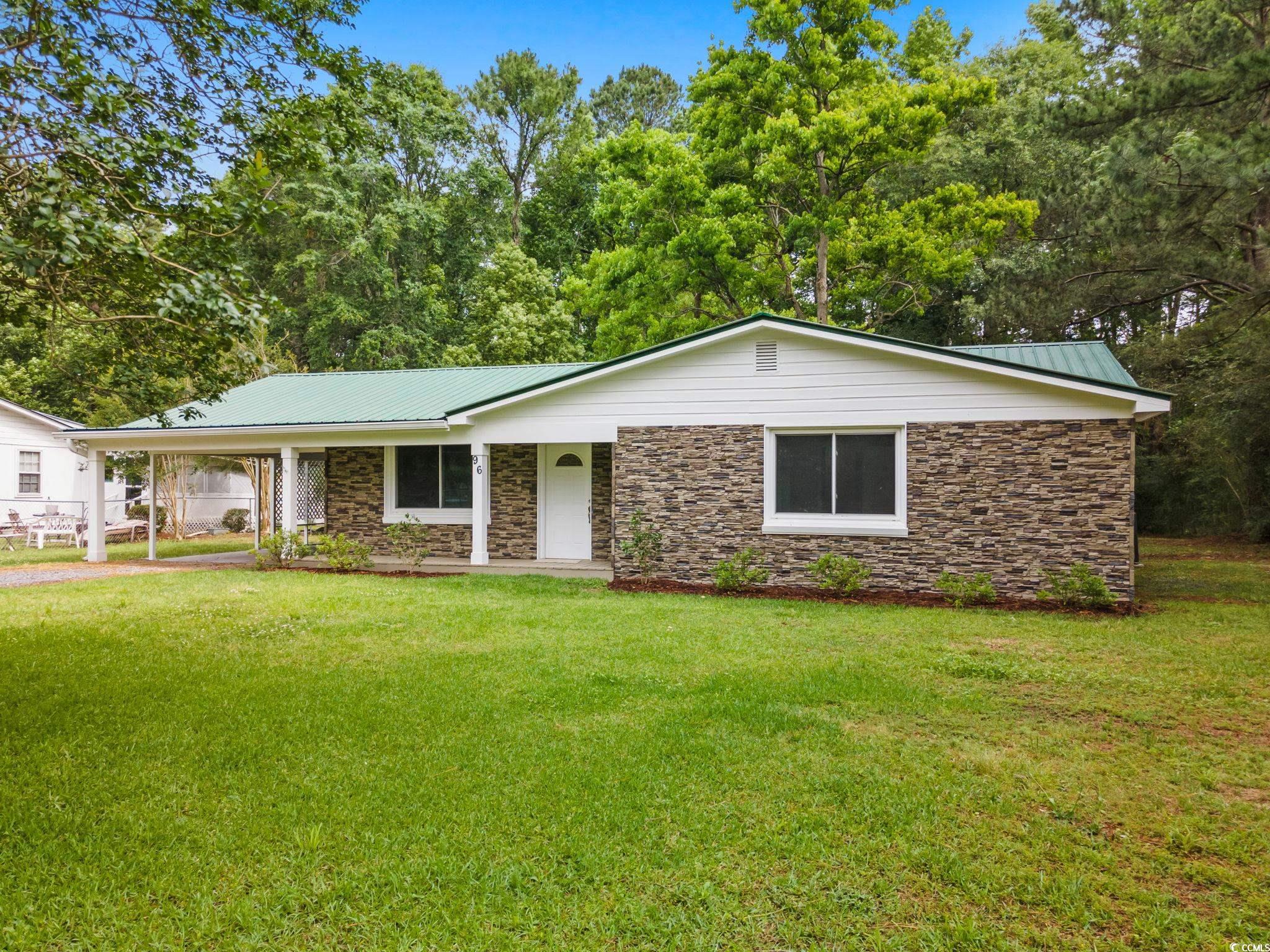 96 Middleton Road Andrews, SC 29510 - Photo 11 of 40 View of front of home featuring stone siding, a fr