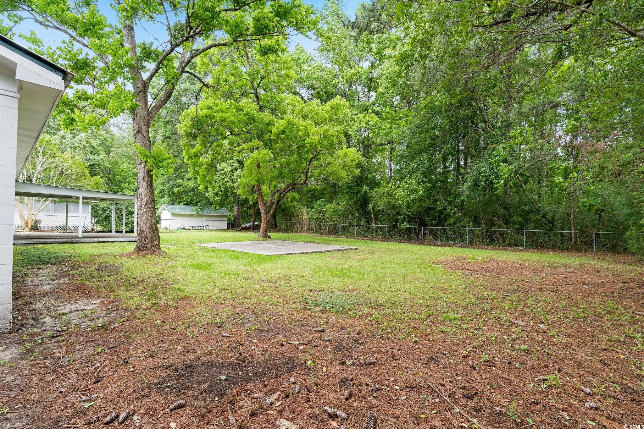 96 Middleton Road Andrews, SC 29510 - Photo 15 of 40 View of yard featuring a patio area