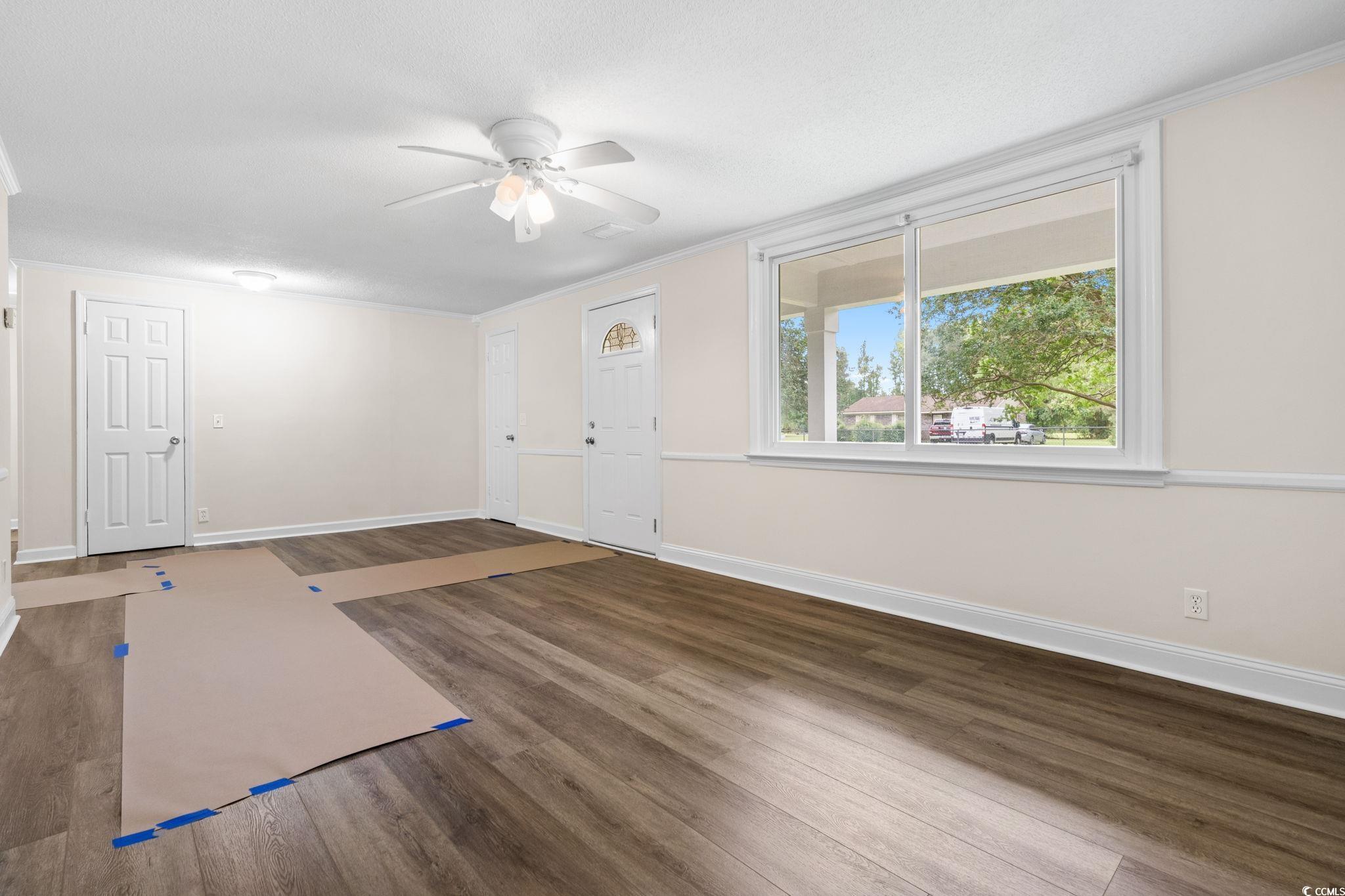 96 Middleton Road Andrews, SC 29510 - Photo 20 of 40 Entrance foyer with wood finished floors, baseboar