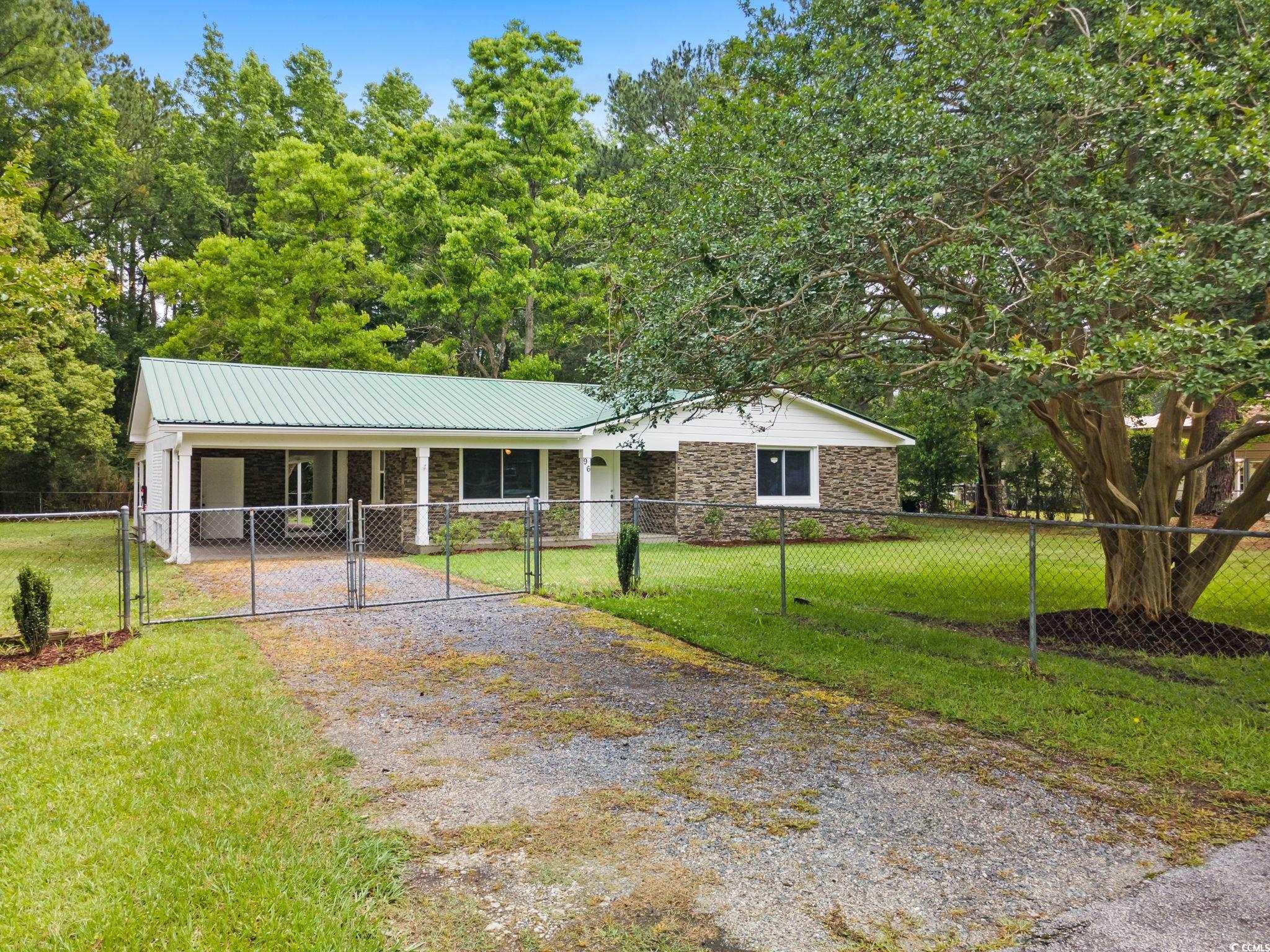 96 Middleton Road Andrews, SC 29510 - Photo 2 of 40 Single story home featuring a gate, driveway, ston