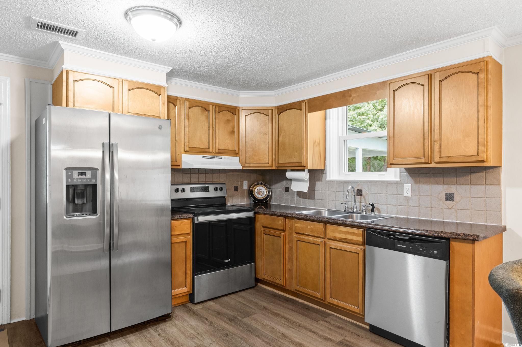96 Middleton Road Andrews, SC 29510 - Photo 22 of 40 Kitchen featuring stainless steel appliances, unde