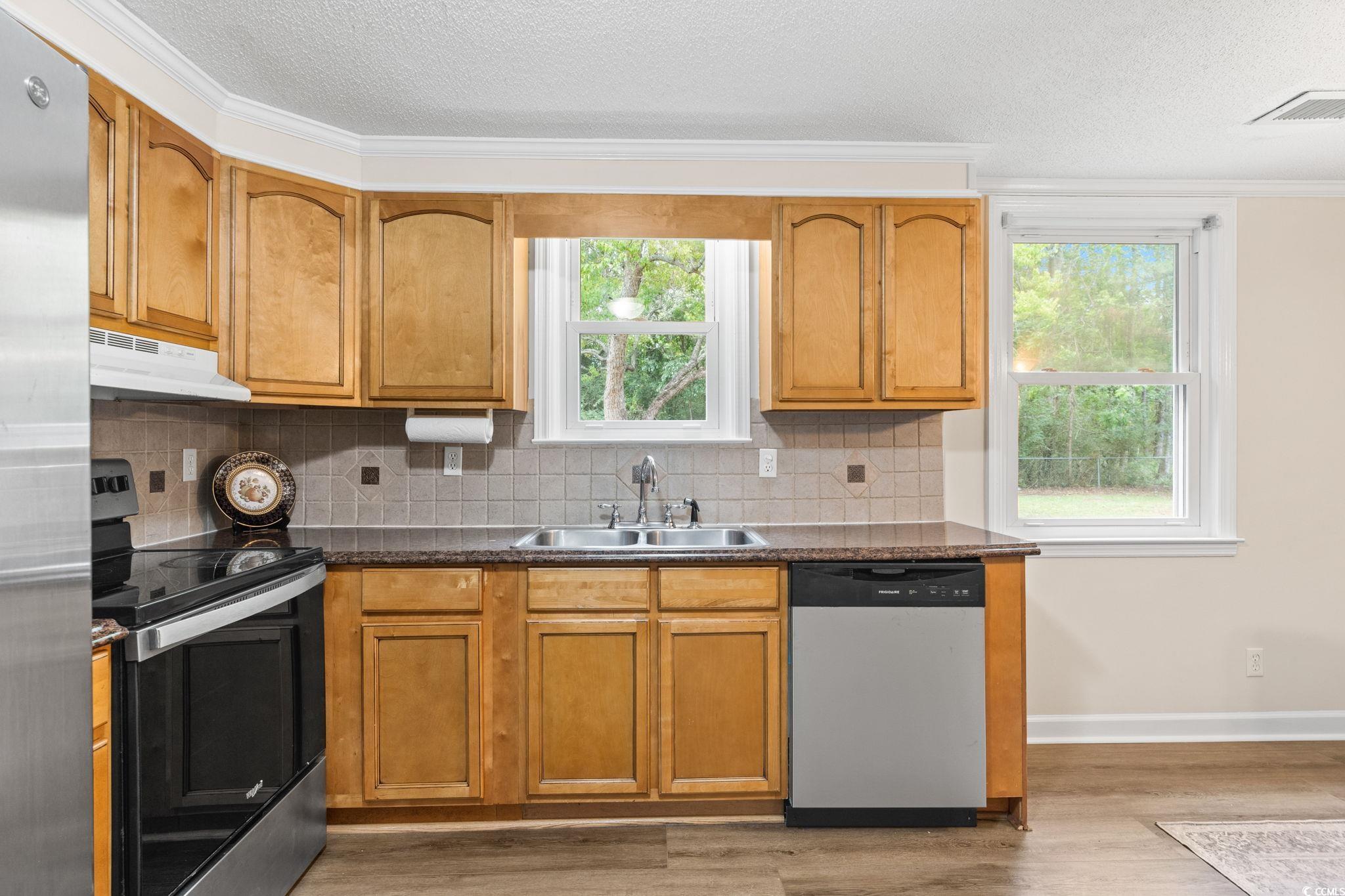 96 Middleton Road Andrews, SC 29510 - Photo 26 of 40 Kitchen with appliances with stainless steel finis