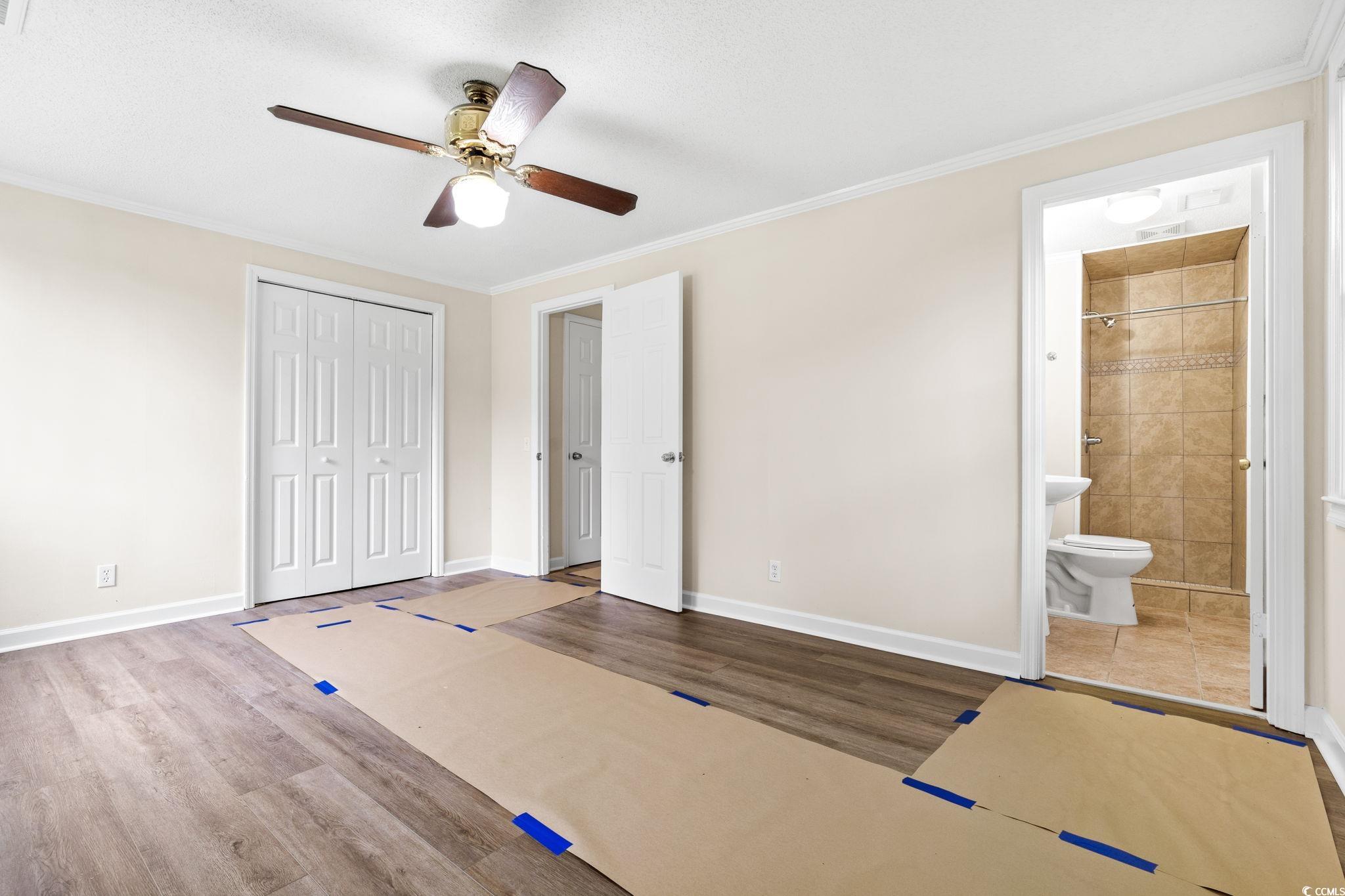 96 Middleton Road Andrews, SC 29510 - Photo 29 of 40 Unfurnished bedroom featuring wood finished floors
