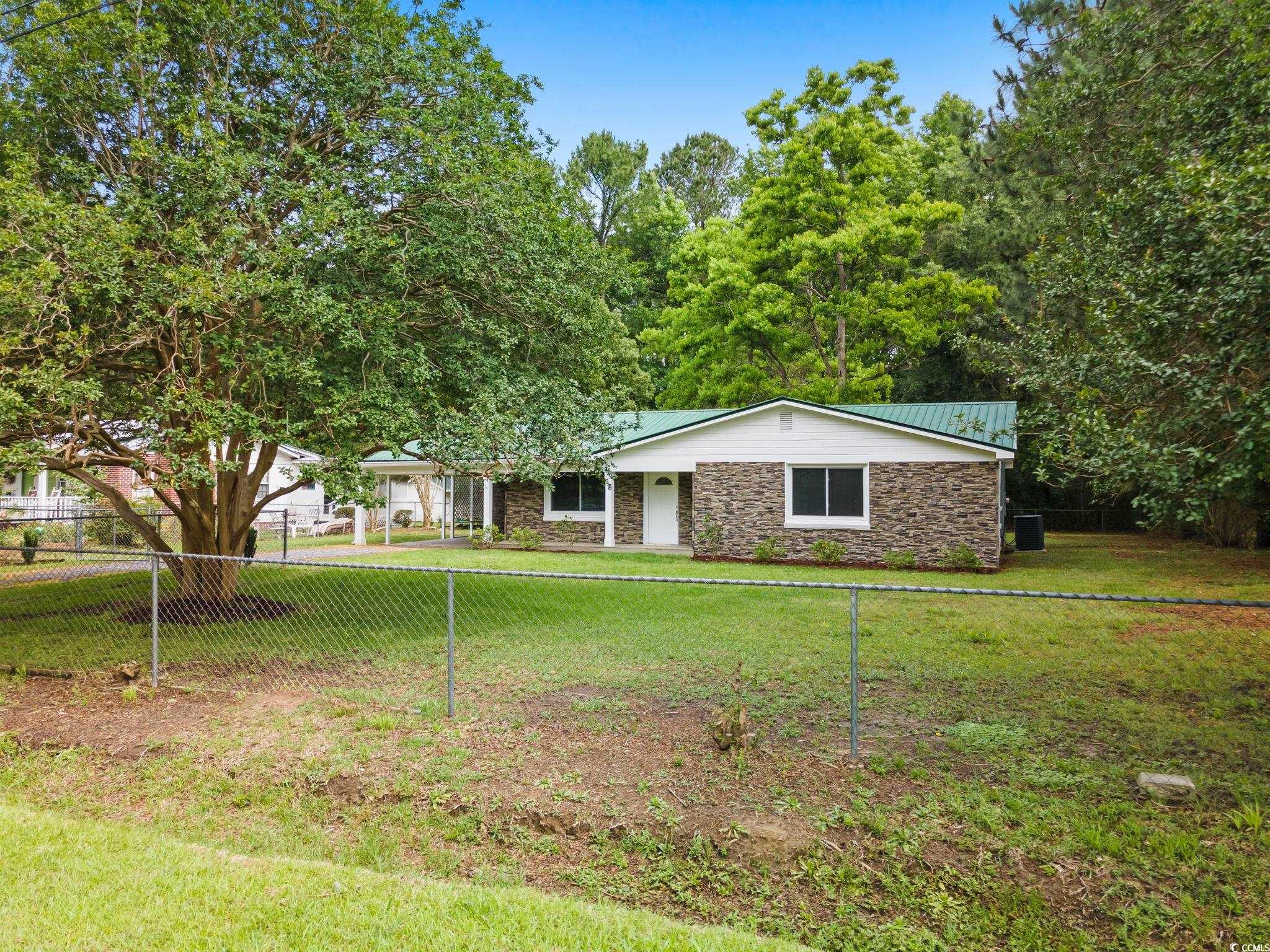 96 Middleton Road Andrews, SC 29510 - Photo 3 of 40 Ranch-style house featuring stone siding and metal