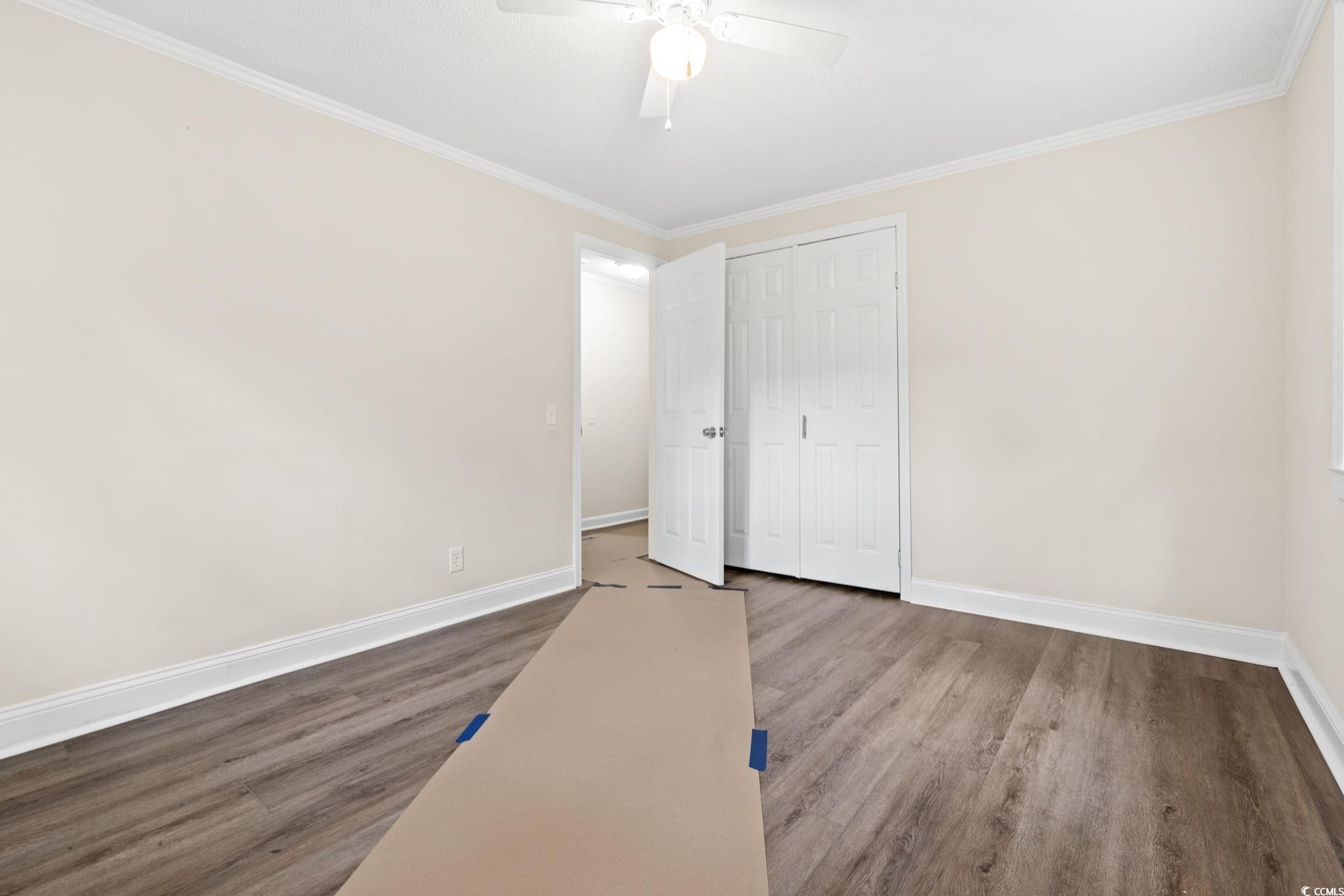 96 Middleton Road Andrews, SC 29510 - Photo 31 of 40 Unfurnished bedroom featuring wood finished floors