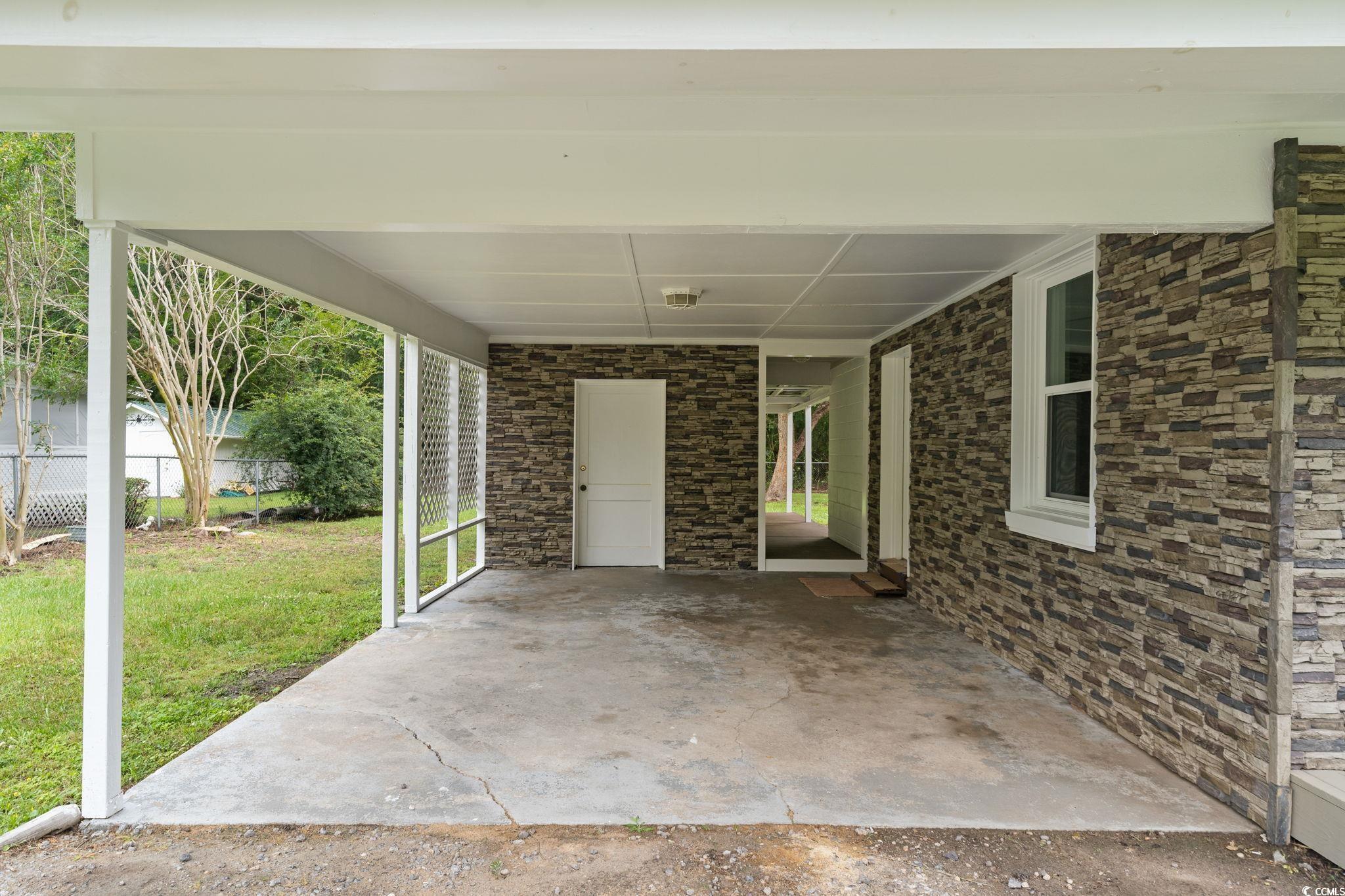 96 Middleton Road Andrews, SC 29510 - Photo 9 of 40 View of patio with an attached carport