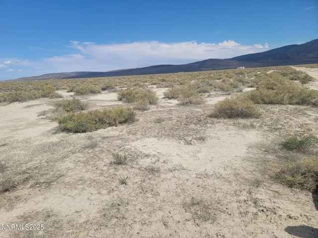 a view of an outdoor space and mountain view