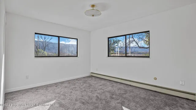 a view of an empty room with window