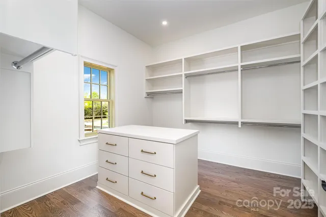 a room with cabinets and window