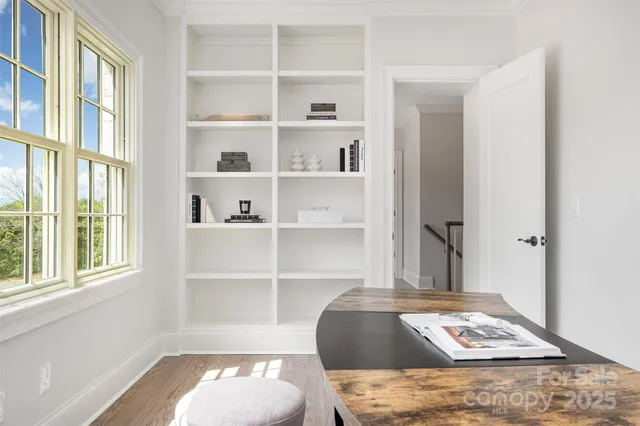 a living room with a couch and a window
