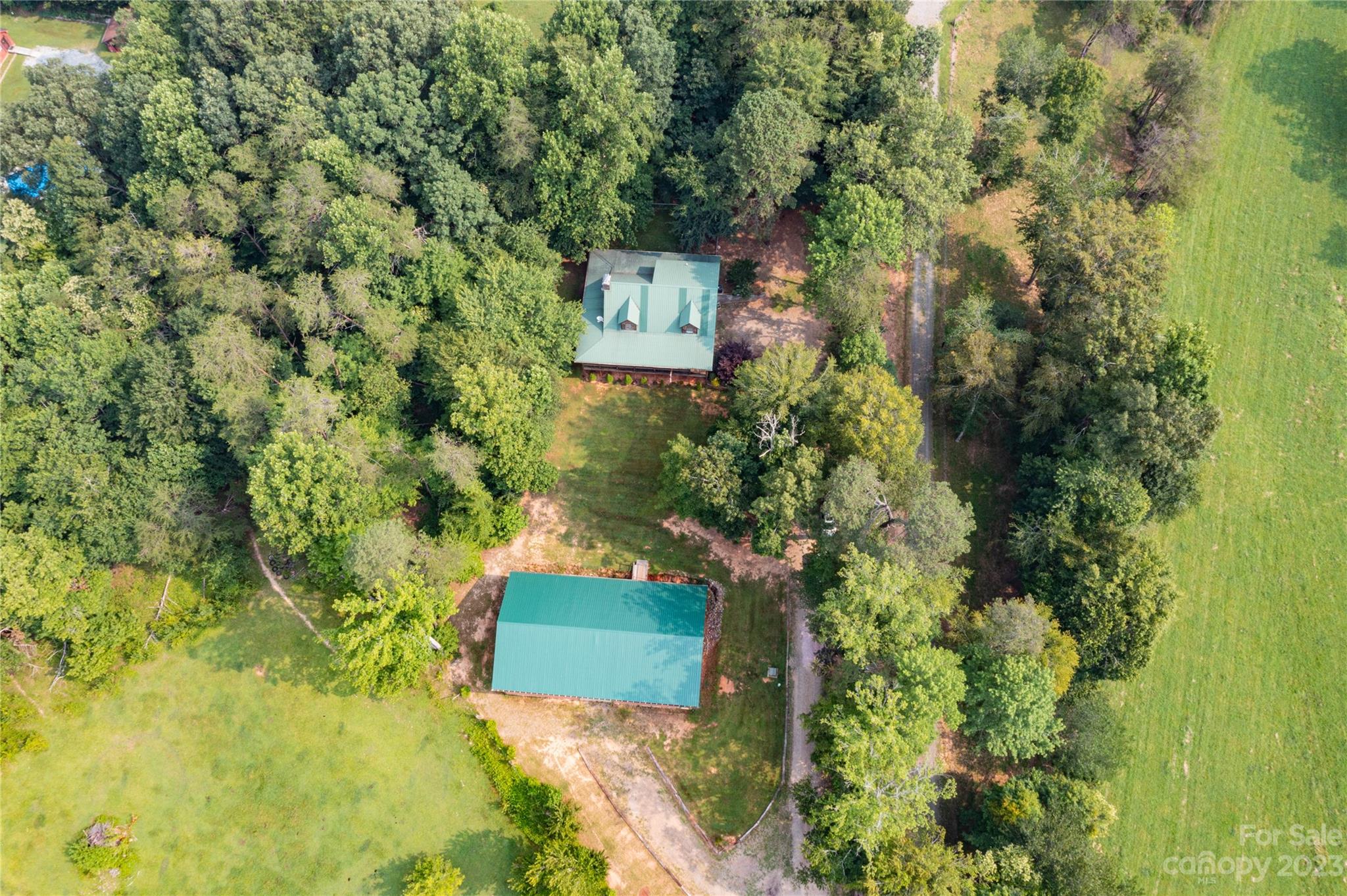 752 Upper Glady Fork Road Candler, NC 28715 - Photo 26 of 38 a view of a house with a yard
