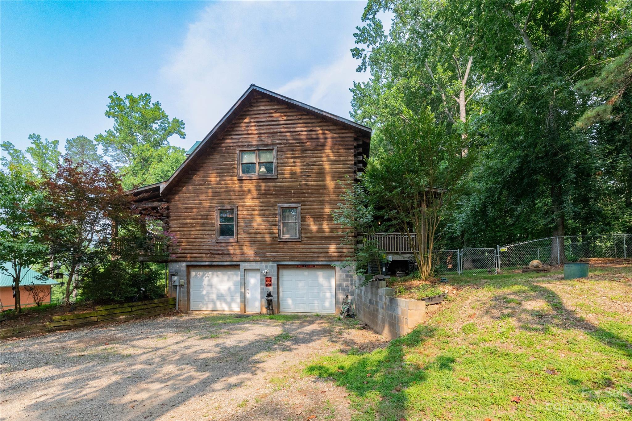 752 Upper Glady Fork Road Candler, NC 28715 - Photo 7 of 38 front view of a house with a yard