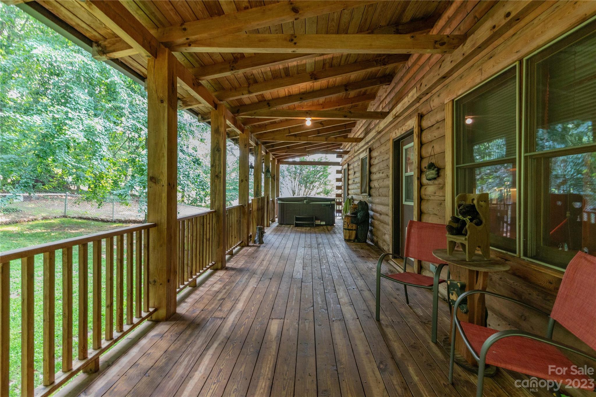 752 Upper Glady Fork Road Candler, NC 28715 - Photo 10 of 38 a view of outdoor space with wooden floor
