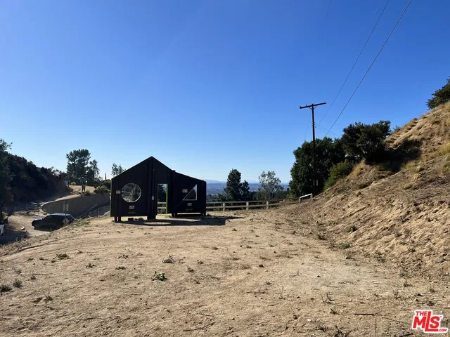 a view of a covered with snow in the background