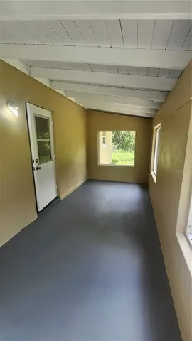 a big yard with lots of green space and deers