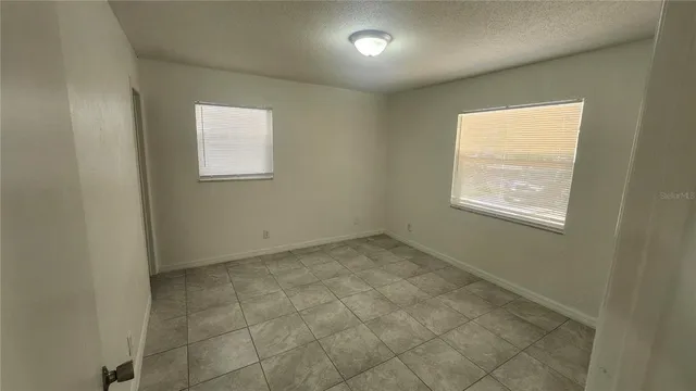 a bathroom with a toilet and shower