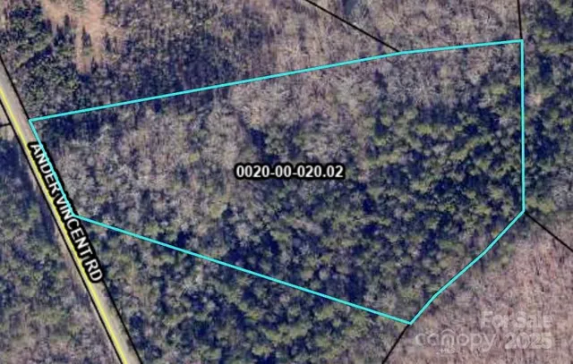 a sign on the side of a wooden wall