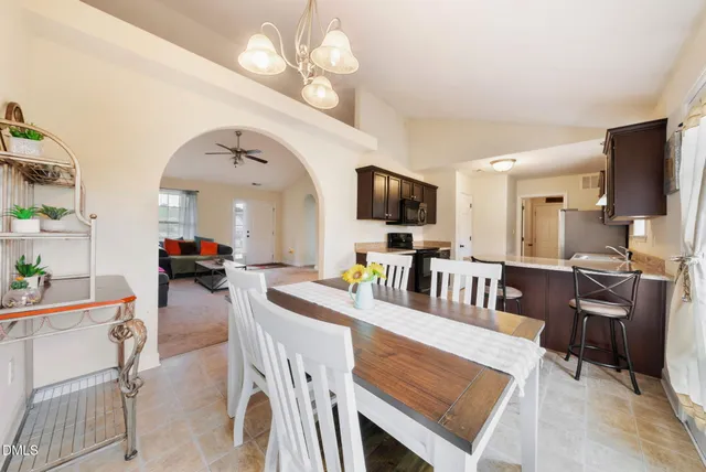 a view of a dining room with furniture