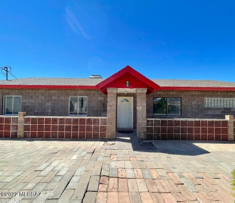 417 Dock Street Rio Rico, AZ 85648 - Photo 2 of 34 a view of a yard with wooden fence