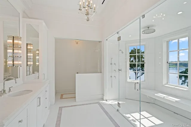 a view of hall way with furniture