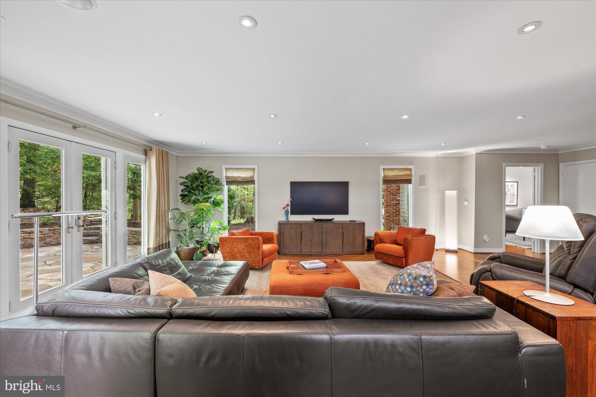 7908 Foxhound Road McLean, VA 22102 - Photo 12 of 48 a living room with furniture and a large window