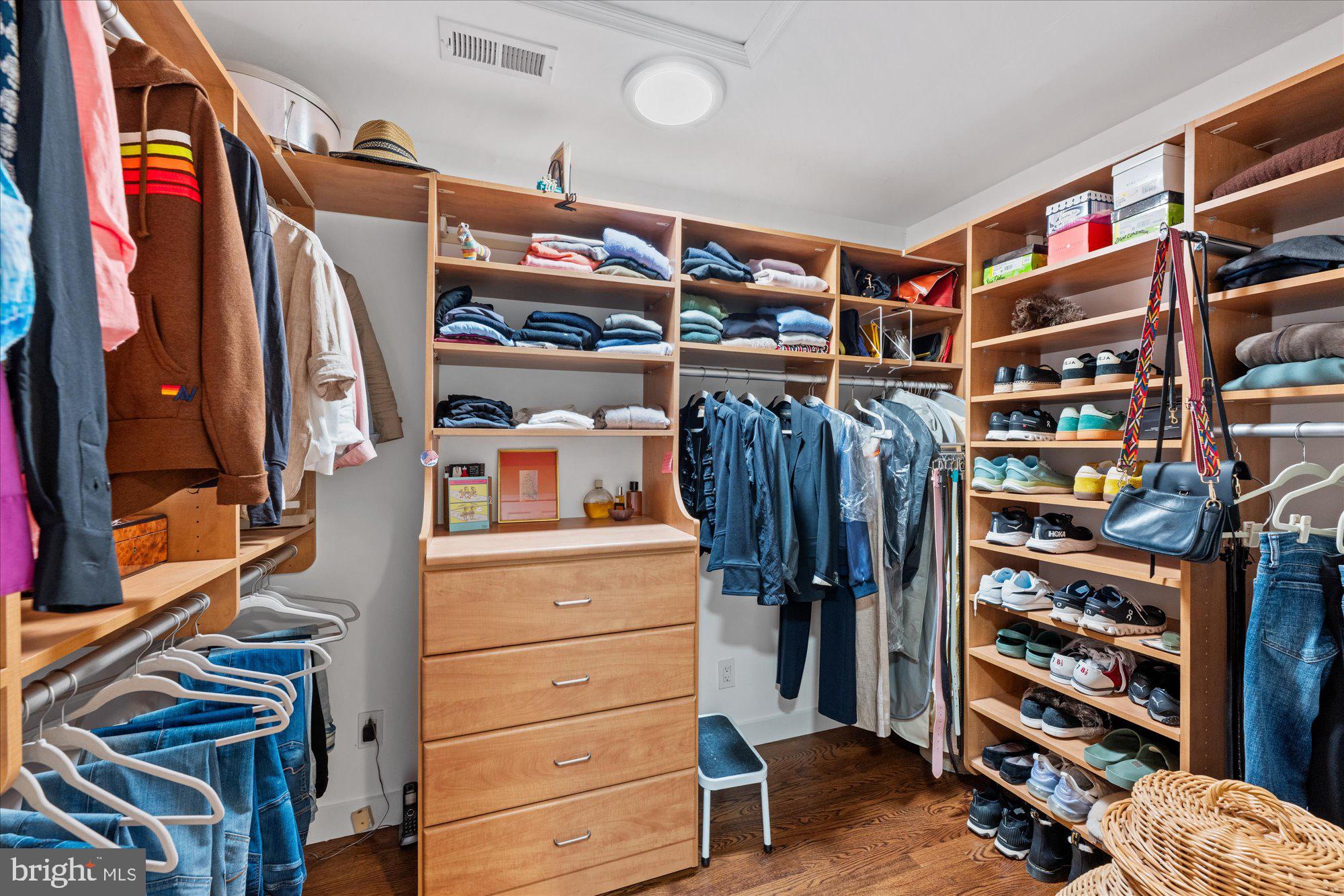 7908 Foxhound Road McLean, VA 22102 - Photo 30 of 48 a view of walk in closet with clothes and shoes