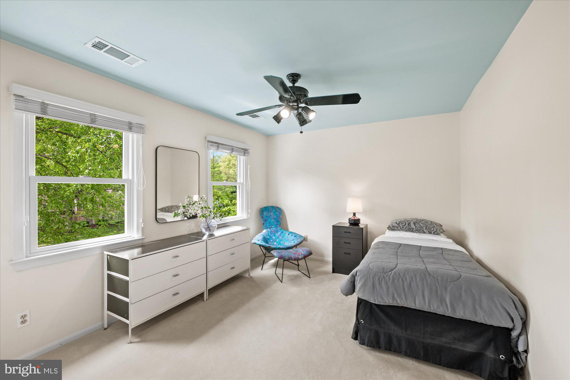 7908 Foxhound Road McLean, VA 22102 - Photo 36 of 48 a bedroom with furniture and a window