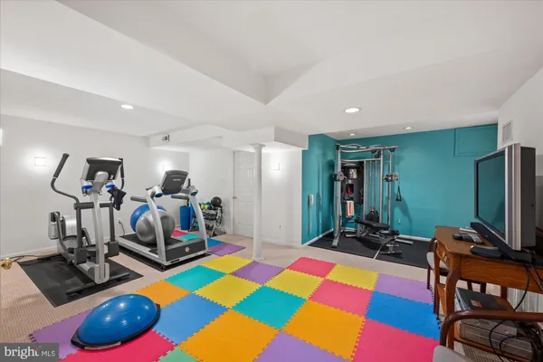a view of a room with gym equipment