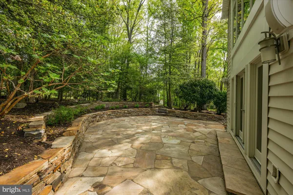 a view of backyard with outdoor space