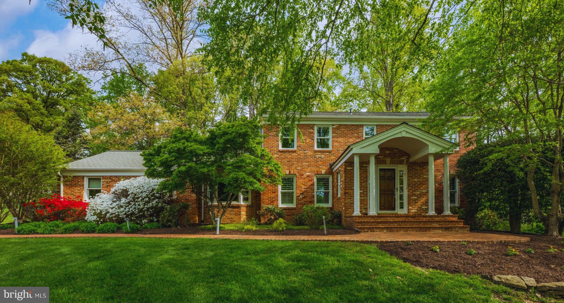 7908 Foxhound Road McLean, VA 22102 - Photo 48 of 48 front view of a house with a yard