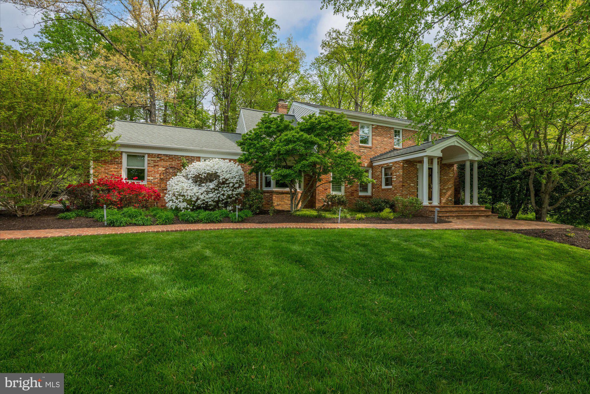7908 Foxhound Road McLean, VA 22102 - Photo 7 of 48 a front view of house with yard and green space