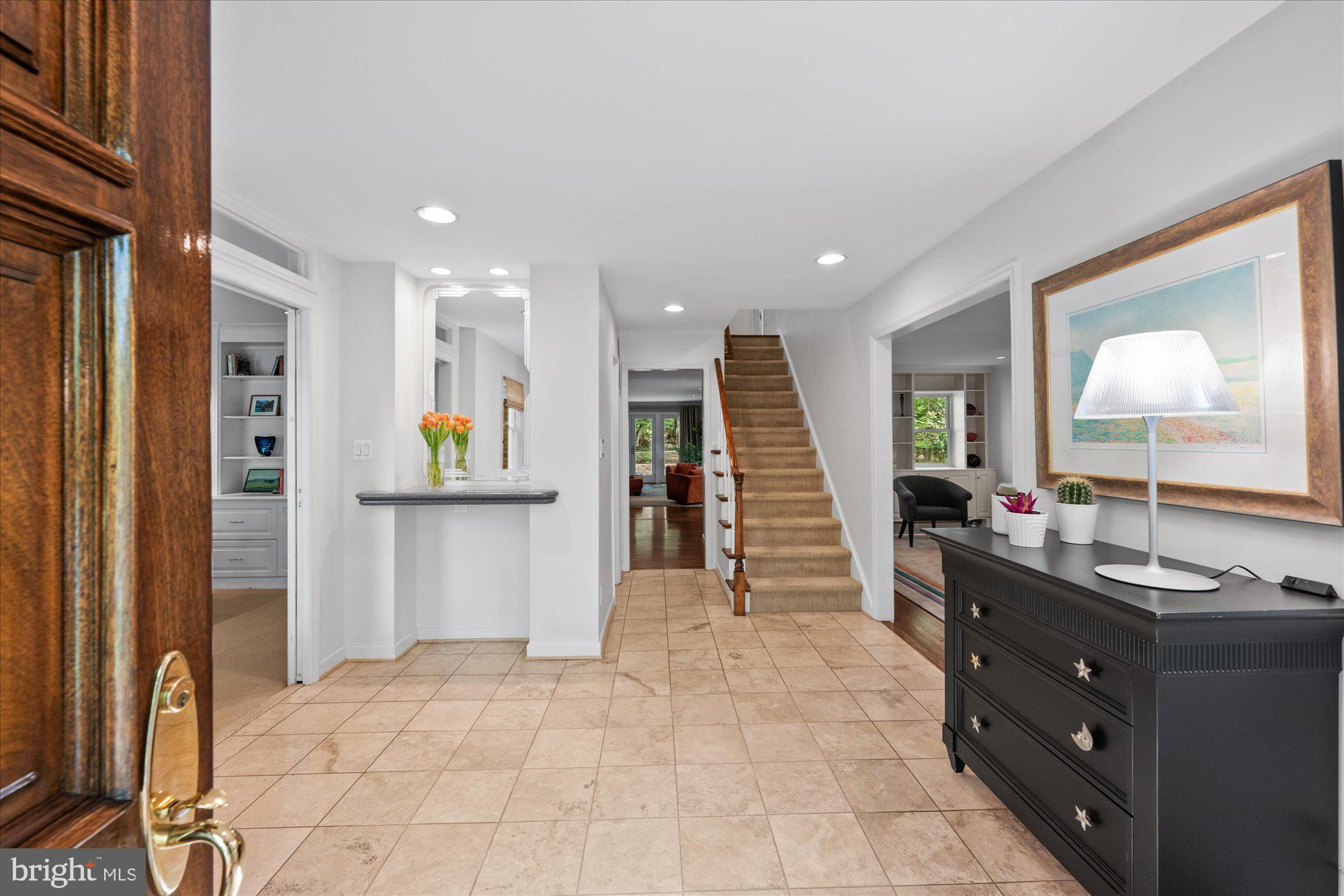 7908 Foxhound Road McLean, VA 22102 - Photo 9 of 48 a bathroom with a sink and a mirror
