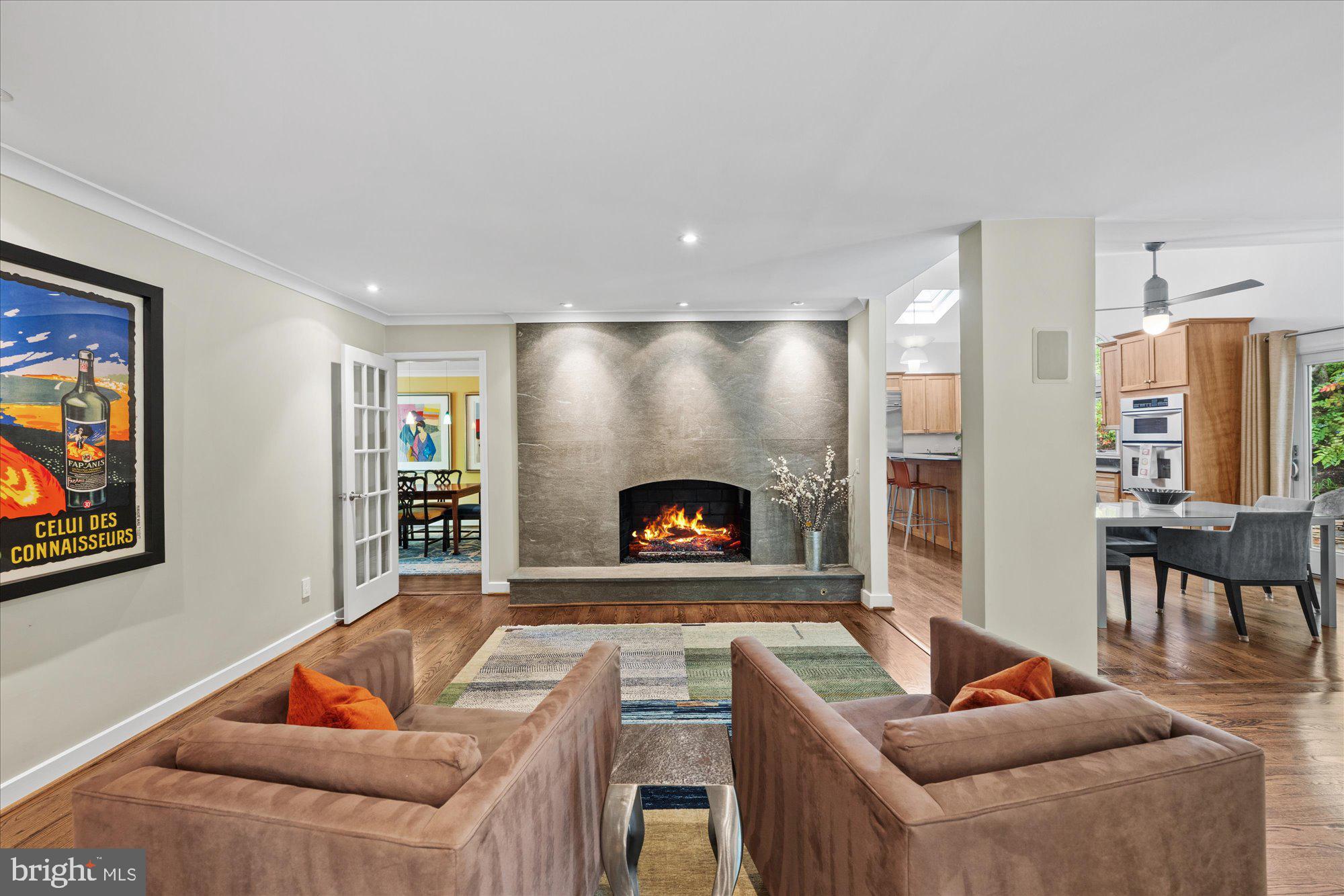 7908 Foxhound Road McLean, VA 22102 - Photo 10 of 48 a living room with furniture and a fireplace