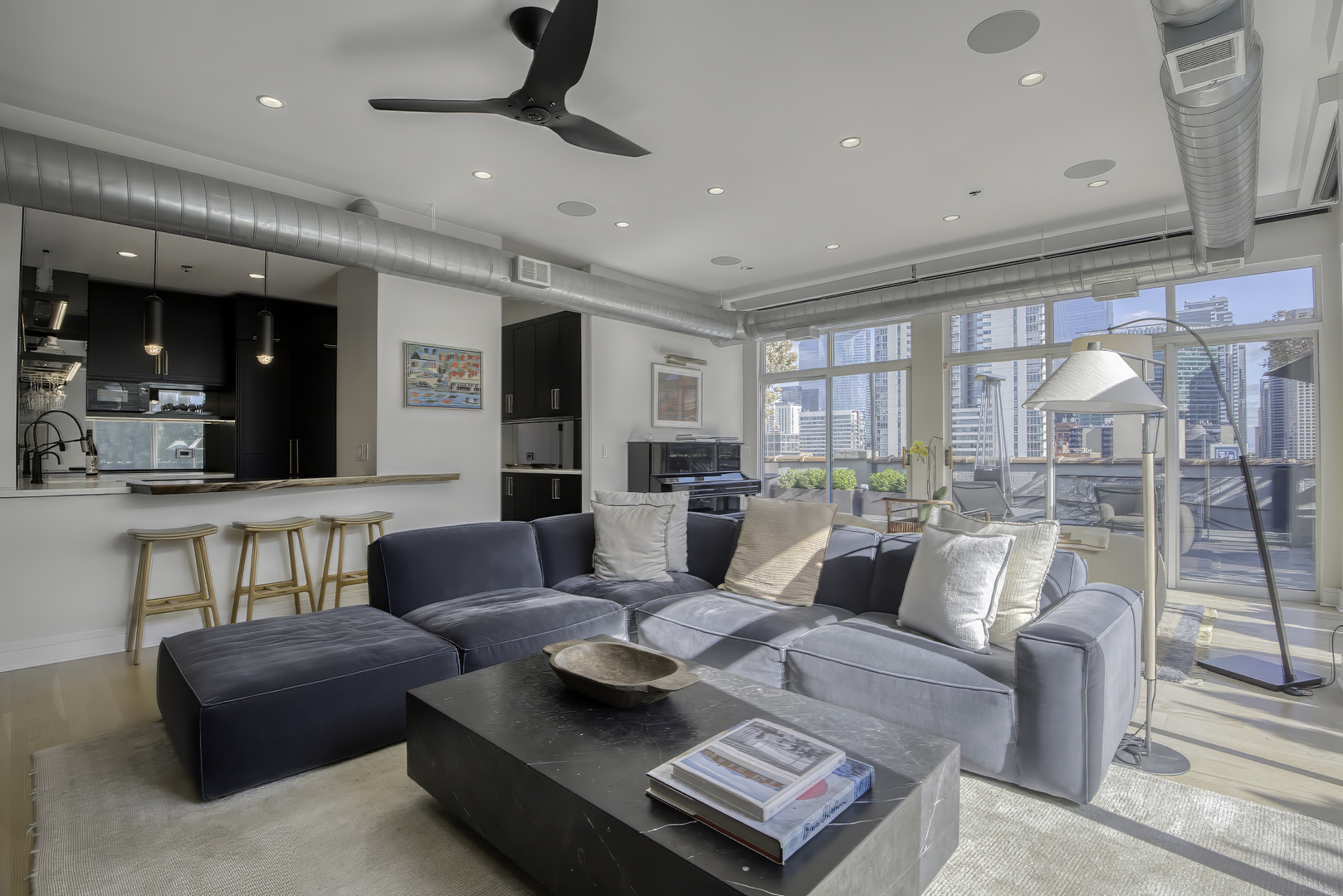 910 West Madison Street, Unit 904E Chicago, IL 60607 - Photo 11 of 56 a living room with furniture and a table