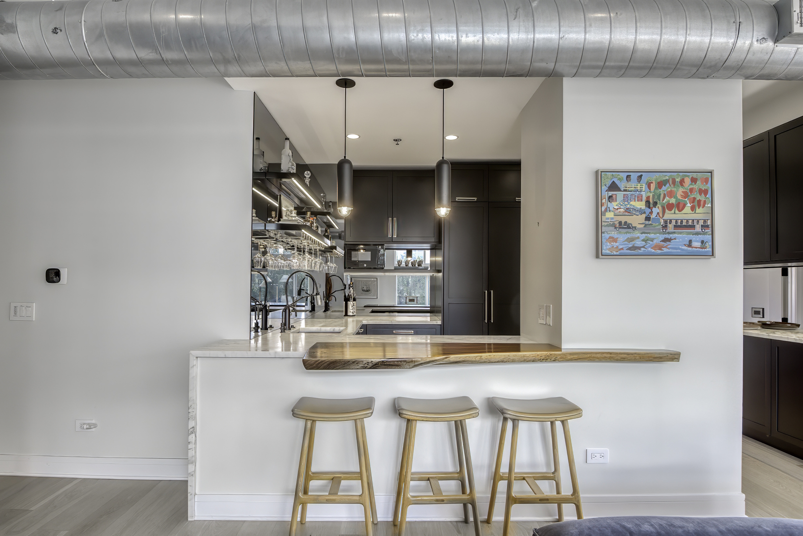 910 West Madison Street, Unit 904E Chicago, IL 60607 - Photo 13 of 56 a kitchen with stainless steel appliances granite countertop a sink and cabinets