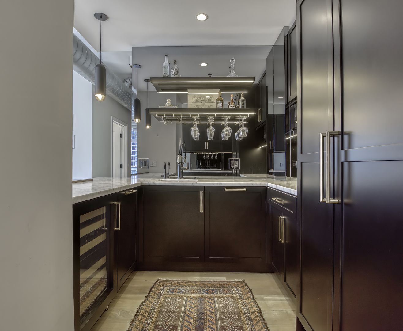 910 West Madison Street, Unit 904E Chicago, IL 60607 - Photo 15 of 56 a kitchen with a refrigerator and countertop