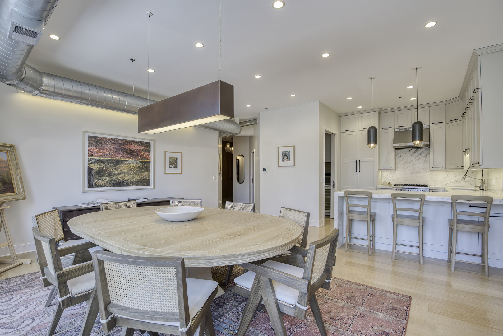 910 West Madison Street, Unit 904E Chicago, IL 60607 - Photo 21 of 56 a view of a dining room with furniture